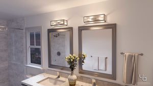 A beautiful Urban Ambiance bathroom with two UHP2751 Industrial Chic Electric Bath Fixtures and a mirror.