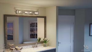 A bathroom vanity features a large mirror, marble countertop, and a potted plant, illuminated by the Urban Ambiance UHP2752 Luxe Industrial Electric Bath Fixture from the Messina Collection (4-1/2″H x 30″W, Stainless Steel Finish), mounted above and reflecting a window with an outside view at dusk.