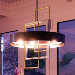 A beautiful Urban Ambiance UHP2782 Modern Chandelier, 26" x 24", Midnight Black Finish, Vegas Collection pendant light in a living room.