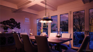 A beautiful dining room with a luxury lighting fixture, the UHP2782 Modern Chandelier from the Vegas Collection by Urban Ambiance.