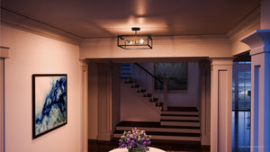 A gorgeous image of a hallway with a UHP2800 Modern Farmhouse Farmhouse Ceiling Light and a vase of flowers.
