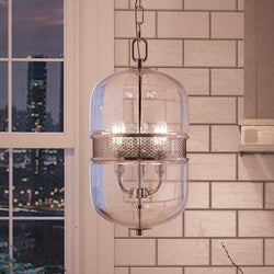 A beautiful UHP2840 Vintage Chandelier, 18-1/4" x 9", Polished Chrome Finish, Varna Collection by Urban Ambiance hanging over a kitchen sink.