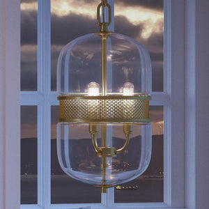 A beautiful UHP2841 Vintage Chandelier, a lighting fixture, hanging over a window.