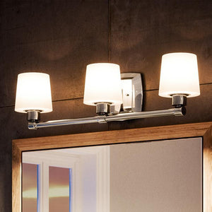 A bathroom with a gorgeous lighting fixture from Urban Ambiance.