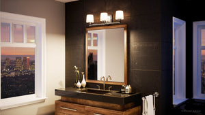 A beautiful Urban Ambiance bathroom with a window and a mirror.