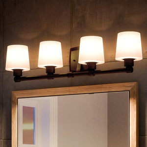 A beautiful bathroom with a UHP2875 Industrial Chic Bathroom Vanity Light, 7-1/4" x 30-3/8", Bronze Finish, Northampton Collection from Urban