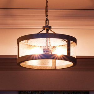 A beautiful Urban Ambiance UHP2890 Rustic Ceiling Light, from the Livorno Collection, hanging from a ceiling in a room.