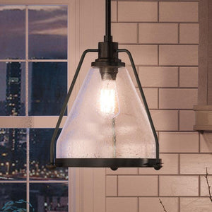 A beautiful and luxurious UHP2993 Industrial Pendant Light from the Rochdale Collection by Urban Ambiance, hanging over a window.