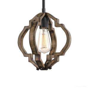 The Urban Ambiance Wycombe Collection UHP3032 Rustic Pendant Light features an exposed vintage bulb encased in a geometric wooden frame with a classic quatrefoil design, suspended from a black cord, and finished in Olde Iron. Measuring 11″ x 10″, it offers a distinctive rustic accent for any space.