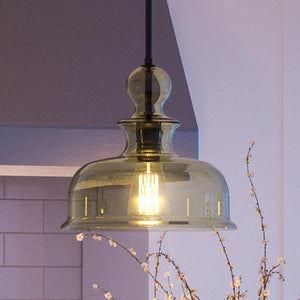 A unique lighting fixture, the UHP3042 Modern Farmhouse pendant light from the Dundee Collection by Urban Ambiance hangs over a kitchen counter.