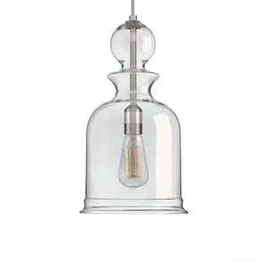 The UHP3043 Modern Farmhouse Pendant Light from Urban Ambiance’s Dundee Collection features a hand-blown clear glass shade, a brushed nickel finish, and a visible vintage-style bulb. Elegantly suspended by a cord, this sculptural pendant measures 16-1/2″ x 9″ and adds contemporary style to any space.