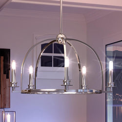 A unique Urban Ambiance UHP3050 Colonial Chandelier, 15.875"H x 25.5"W, Polished Nickel Finish, Somerville Collection lighting fixture hanging over a