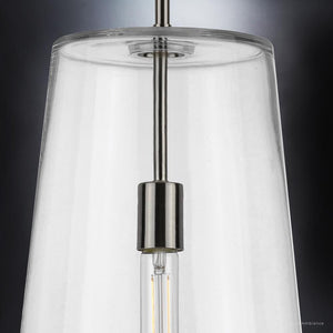A beautiful Colonial Pendant Light with a clear glass shade.
