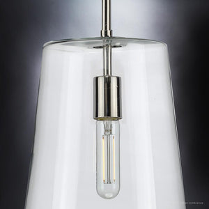 A luxury pendant lamp with a glass shade and metal base, designed by Urban Ambiance.