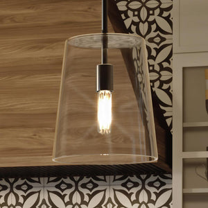 A luxury lighting fixture, UHP3100 Colonial Pendant Light from the Tustin Collection by Urban Ambiance, hangs over a kitchen counter.