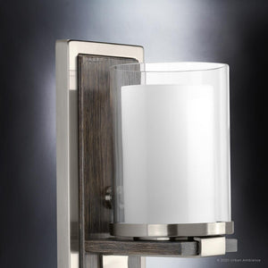A beautiful Urban Ambience wall sconce lighting fixture with a glass candle holder.