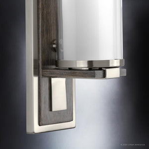 A unique UHP3160 contemporary wall sconce with a glass cylinder by Urban Ambiance.