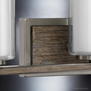 An UHP3180 Contemporary Bath Vanity Light fixture with two unique glass vases, from the Urban Ambiance Evanston Collection.