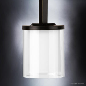 An Urban Ambiance UHP3201 Contemporary Pendant Light with a clear glass shade, exuding luxury and beauty.