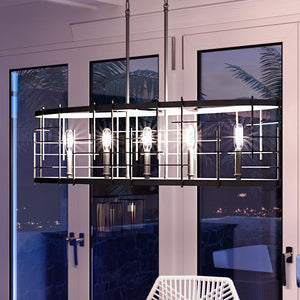 A modern luxury dining room with the UHP3230 Electric Chandelier, 11.375"H x 40"W, Midnight Black Finish, Springdale Collection by Urban Ambiance table and chairs featuring