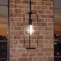 A unique and beautiful lighting fixture, the UHP3271 Urban Loft Pendant Light, hangs from a brick wall with a view of the city.