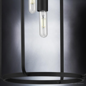 A luxury pendant lamp, the UHP3281 Urban Loft Pendant Light from the Loveland Collection by Urban Ambiance, features a Midnight Black Finish and two hanging bulbs for stunning lighting.