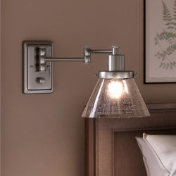 A luxury bedroom with a unique lighting fixture, the UHP3300 Traditional Wall Light, Brushed Nickel Finish.