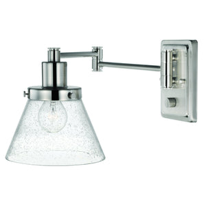 An UHP3300 Traditional Wall Light with a clear glass shade, 9.625