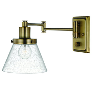 A unique lighting fixture, the UHP3302 Traditional Wall Light from Urban Ambiance features a clear glass shade.