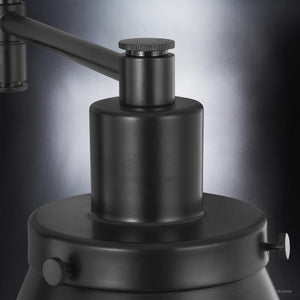 A beautiful lighting fixture, the UHP3311 Traditional Wall Light from the Pawtucket Collection by Urban Ambiance features a metal base and Midnight Black Finish.