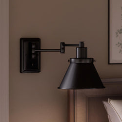 A unique bed with a gorgeous UHP3311 Traditional Wall Light from the Pawtucket Collection by Urban Ambiance on the wall.