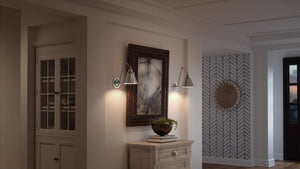 A hallway with a beautiful Urban Ambiance UHP3320 Traditional Wall Light and a dresser.