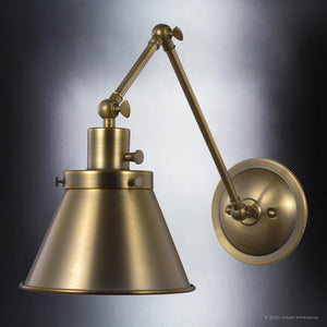 A beautiful and unique lighting fixture, the UHP3322 Traditional Wall Light from the Pawtucket Collection by Urban Ambiance features an Olde Brass Finish and measures 14.375