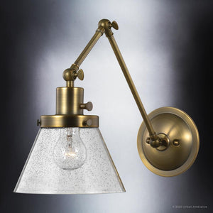 A unique lighting fixture from the Pawtucket Collection by Urban Ambiance with a glass shade.