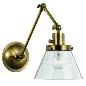 A luxury UHP3332 Traditional Wall Light with a clear glass shade.