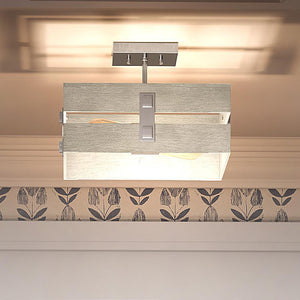 A unique and beautiful UHP3350 Modern Farmhouse Ceiling Light, with a Galvanized Steel Finish from the Southfield Collection by Urban Ambiance, in a room with a wallpaper pattern.