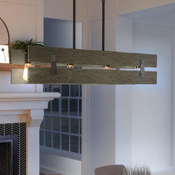 A beautiful and unique Urban Ambiance UHP3361 Modern Farmhouse Chandelier, 7.875"H x 36"W, Midnight Black Finish from the Southfield Collection hanging over a fireplace in