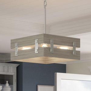 A gorgeous pendant lamp from the Urban Ambiance Southfield Collection, with a galvanized steel finish, hanging in the kitchen.