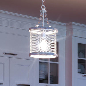 A unique and beautiful lighting fixture, the Urban Ambiance Provincial Pendant Light, with a Galvanized Steel Finish, from the Layton Collection is hanging over a kitchen island.