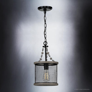 An UHP3381 Provincial Pendant Light with a metal cage hanging from it for beautiful lighting fixture.