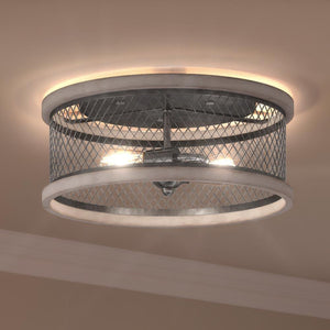 A gorgeous UHP3390 Provincial Ceiling Light, 6.5"H x 14"W, Galvanized Steel Finish, Layton Collection by Urban Ambiance with a metal cage in the