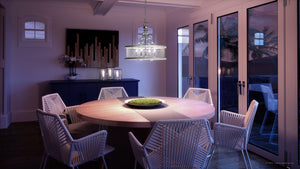 A luxury dining room with a white Urban Ambiance UHP3400 Provincial Chandelier lighting fixture.