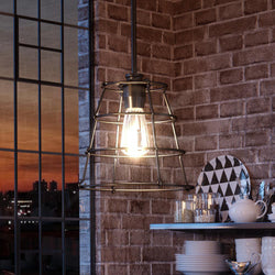 A luxurious UHP3421 Urban Loft Pendant Light, 11"H x 10"W, in a Midnight Black Finish from the Franklin Collection by Urban Ambiance hanging over a beautiful kitchen counter.