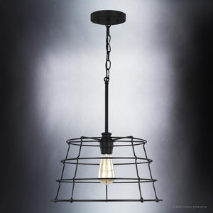 A UHP3431 Urban Loft Pendant Light with a beautiful wire cage hanging from it.