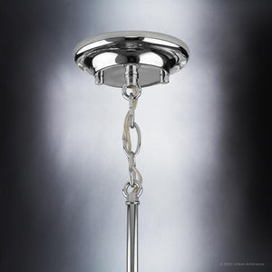 A luxurious pendant lamp with a gorgeous chain hanging from it.