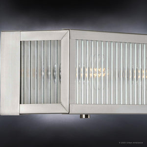 A unique lighting fixture from the Bismarck Collection with a glass shade.