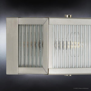 A gorgeous UHP3590 Minimalist Bath Vanity Light with a glass shade.
