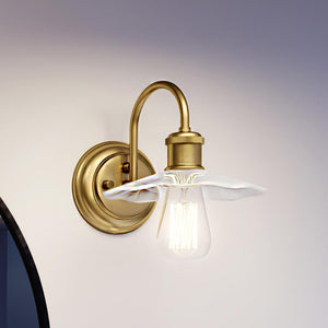A beautiful UHP3661 Vintage Bath Vanity Light with a clear glass shade.