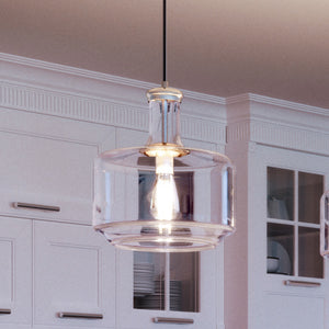 A kitchen with white cabinets and an Urban Ambiance UHP3720 Industrial Chic Pendant Light, 14"H x 12.25"W, Brushed Nickel Finish, Eagan Collection.