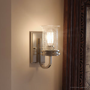 A unique UHP3740 French Country Bath Vanity Lighting fixture, 9.5"H x 4.75"W, with a light on it.